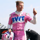 Nico Hulkenberg in pink Racing Point overalls.